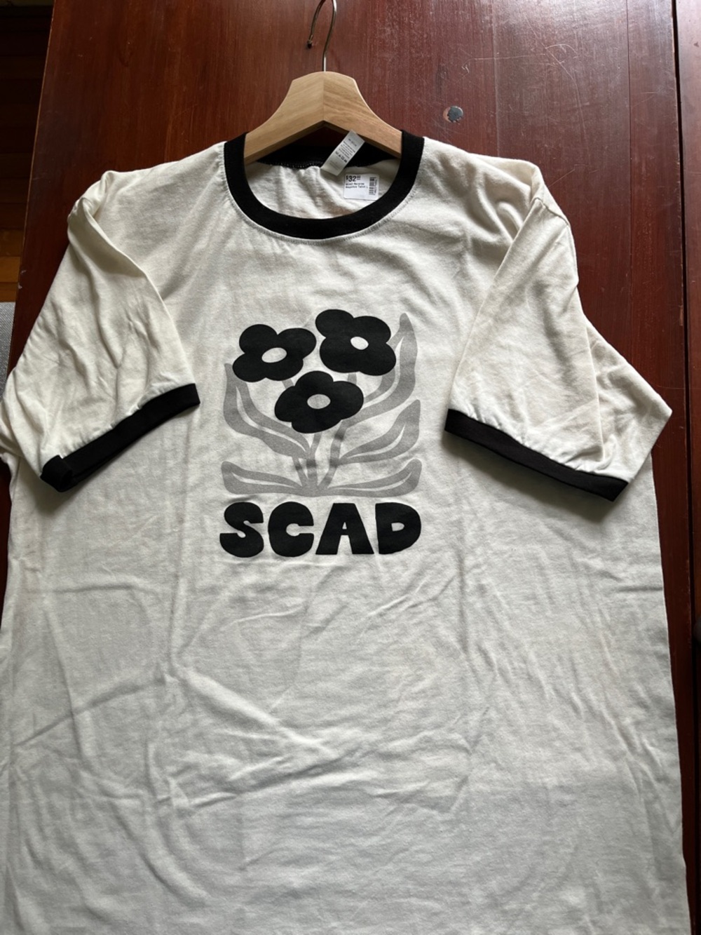 Reverse White Ringer Tee with Black Floral Graphic